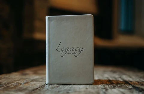 Front view of a leather-bound 'Legacy Journal,' intended for capturing and sharing life lessons and legacies.