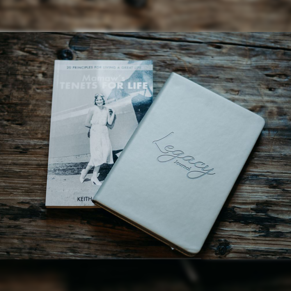 'Mamaw's Tenets for Life' with a vintage black-and-white photo of a woman in a dress and the 'Legacy Journal' in grey leather binding.