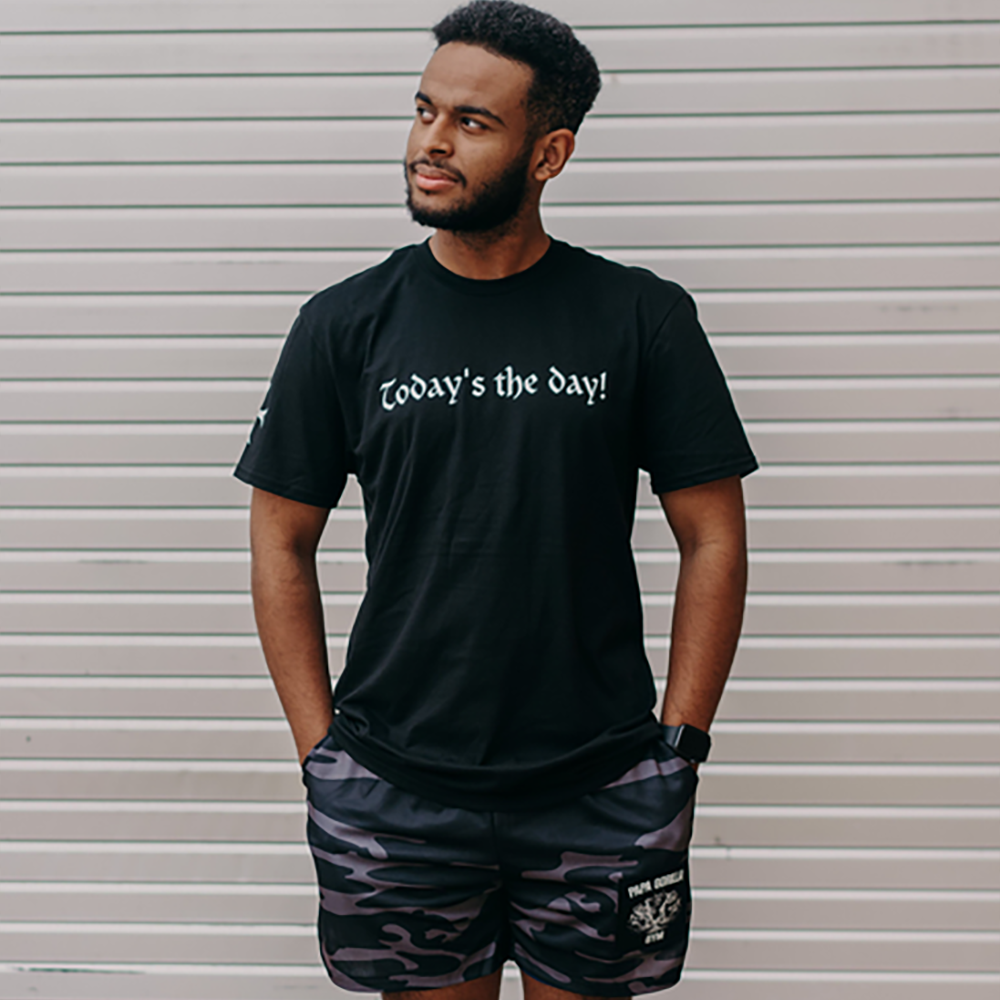 A man in a black shirt featuring 'Today's the Day' prominently displayed across the front.
